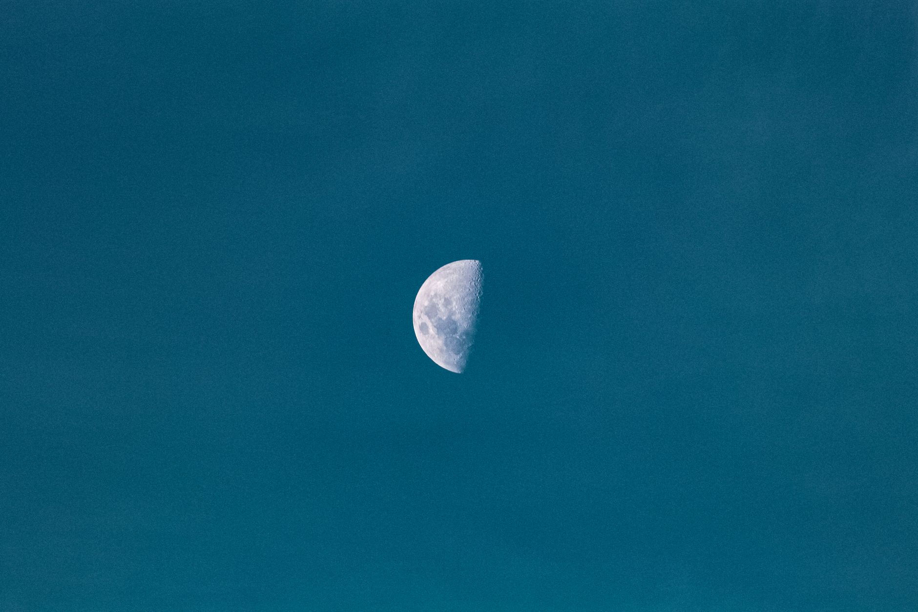 A calm, atmospheric scene evoking practical lunar water charging and using each moon phase.